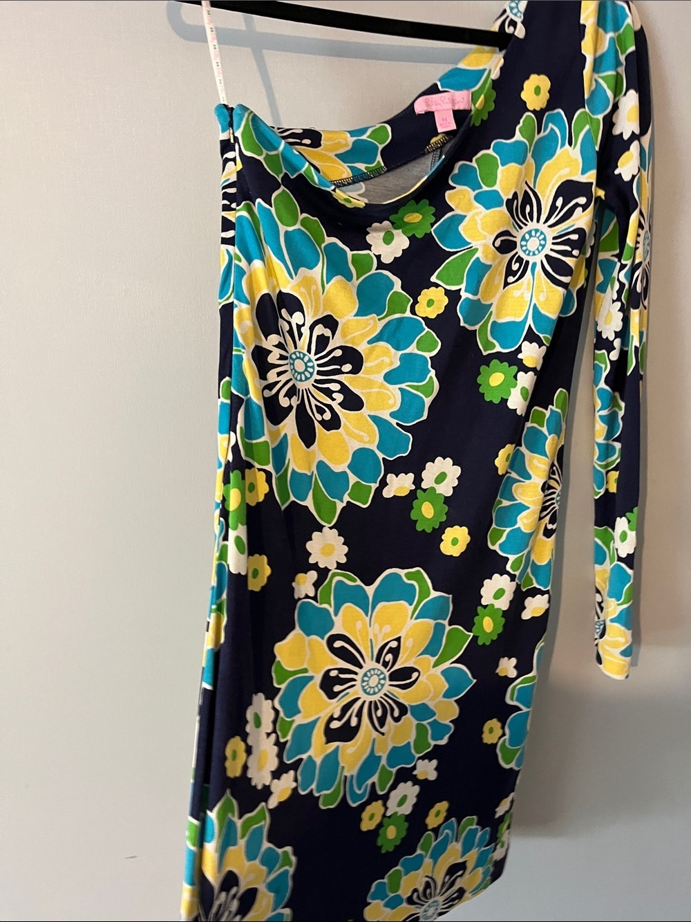 Navy one shoulder dress with large bright flowers